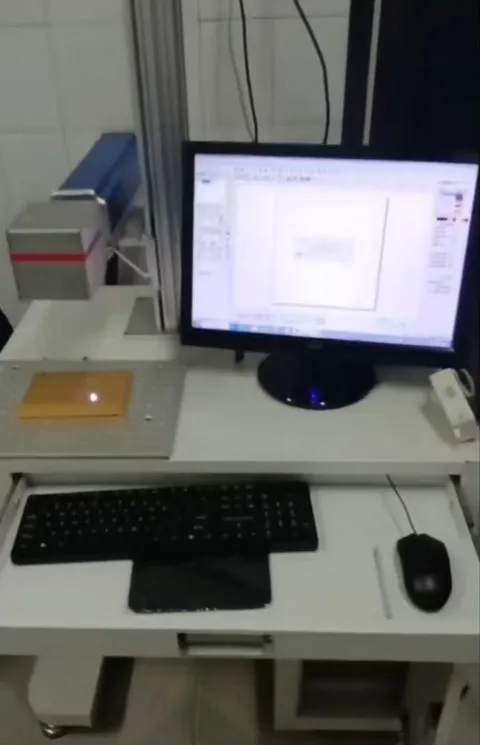 M&aacute;quina de codificaci&oacute;n l&aacute;ser (antigua)
